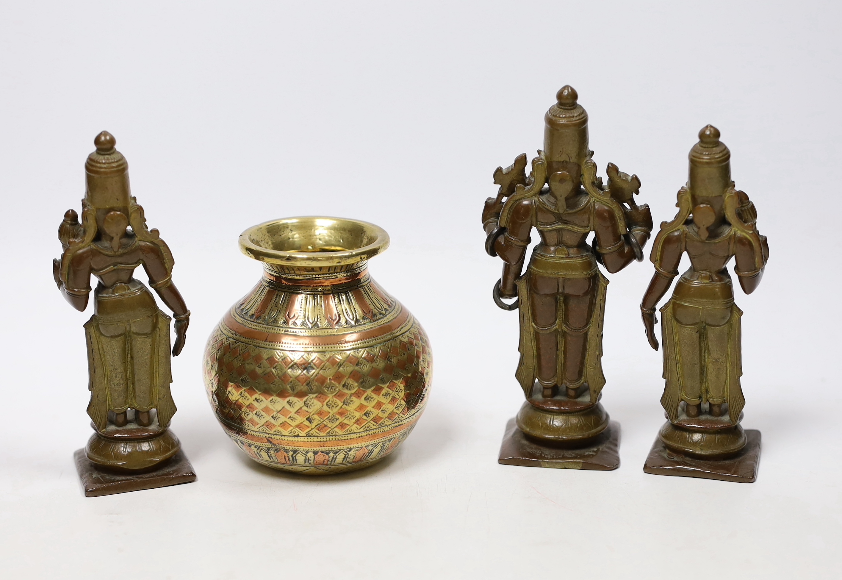 A Ganga-Jamuna figure of Vishnu and two consorts, 18th century together with a small South Indian pot, tallest 13cm